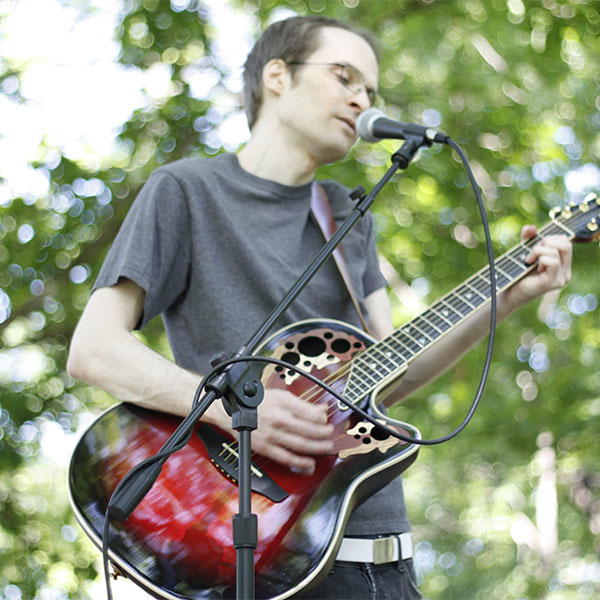 John Bonnell-Playing Guitar and Singing